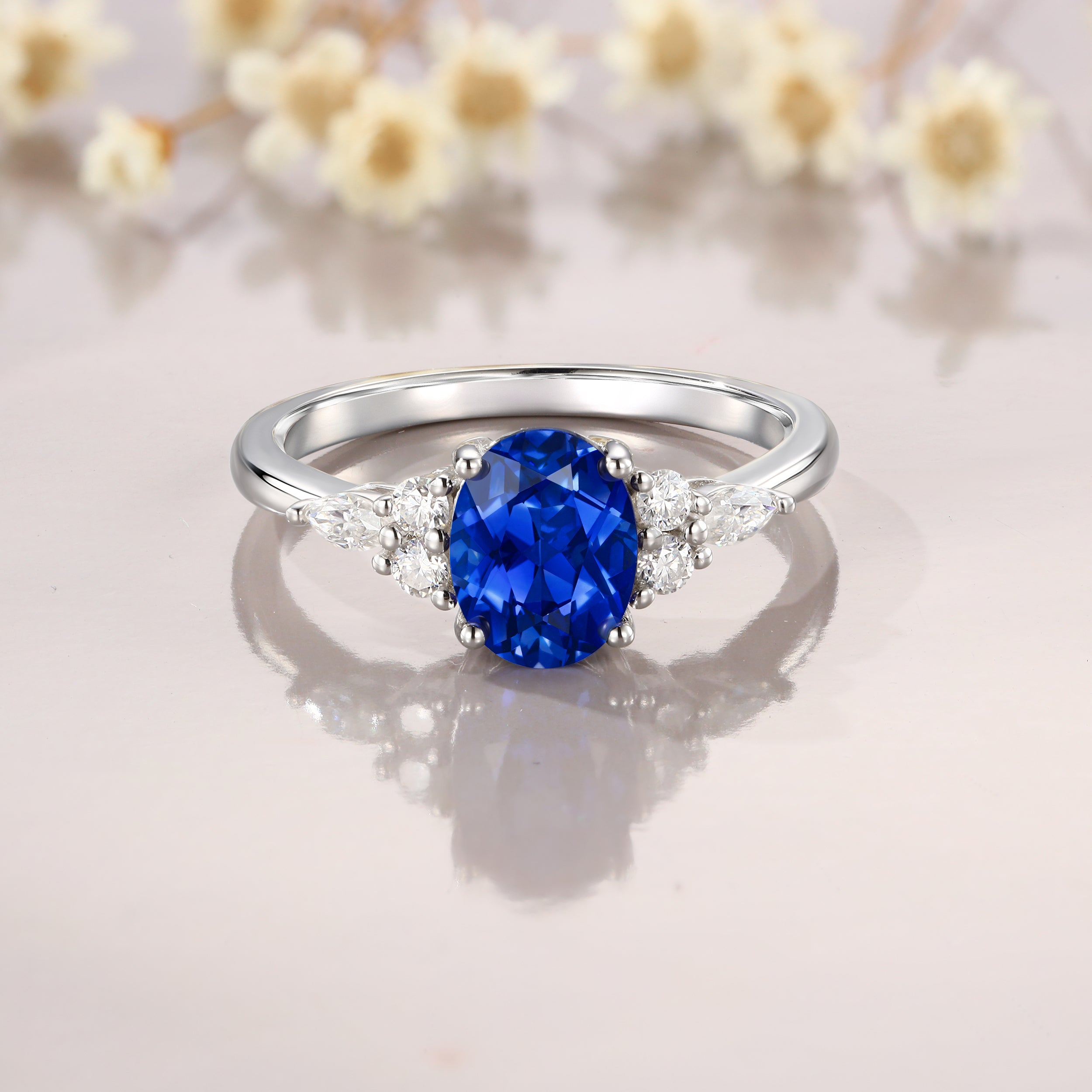1.5CT Oval Cut Sapphire Ring in White Gold with Moissanite
